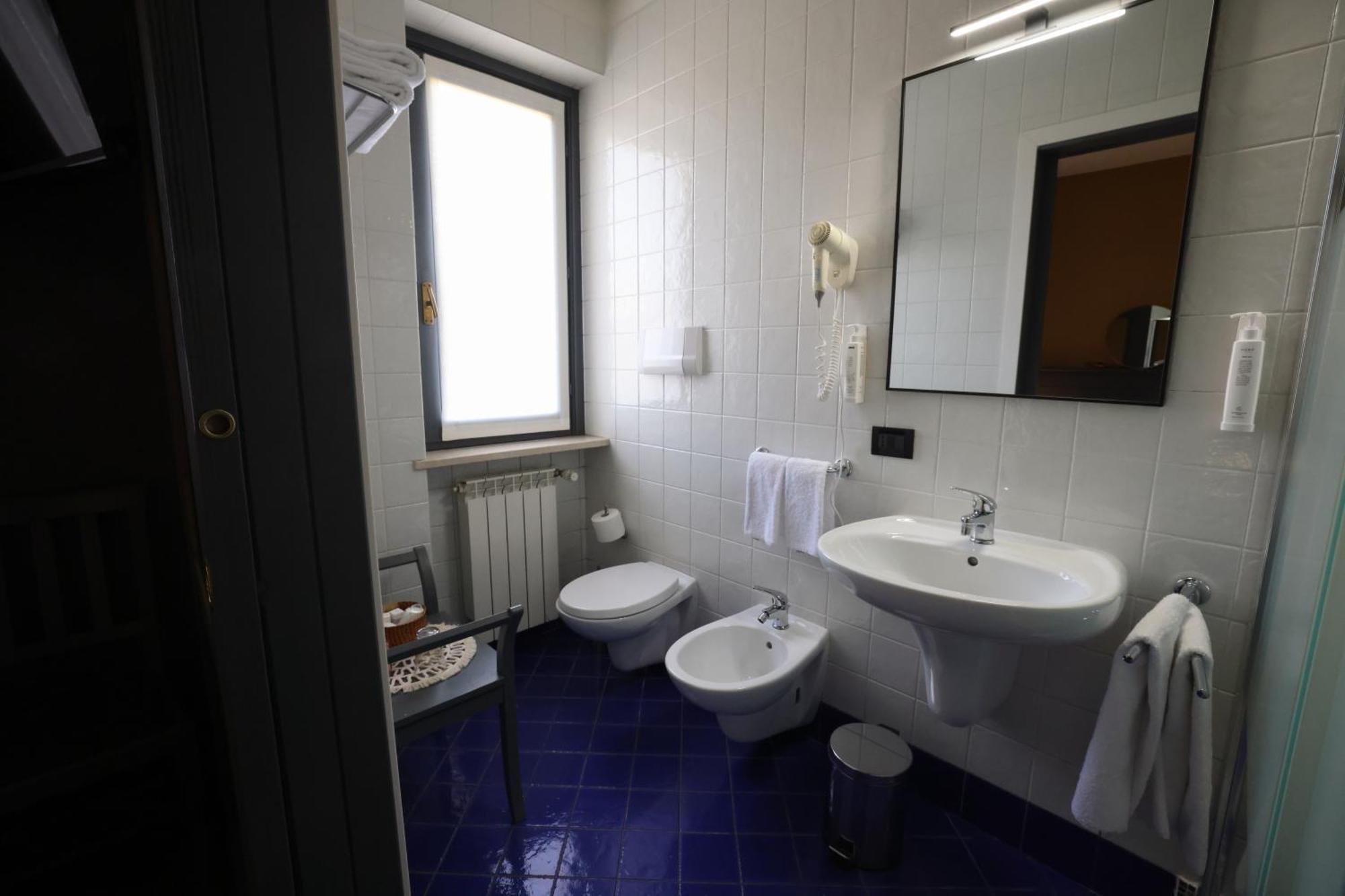 Hotel Florence Manerba del Garda Pokoj fotografie